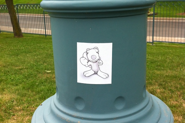Earl the Angry Squirrel sticker on a lamppost
